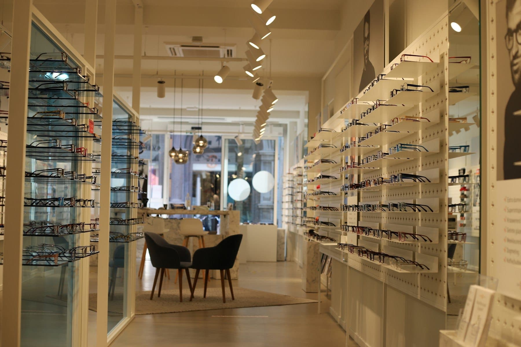 Optical store interior with illuminated frame walls